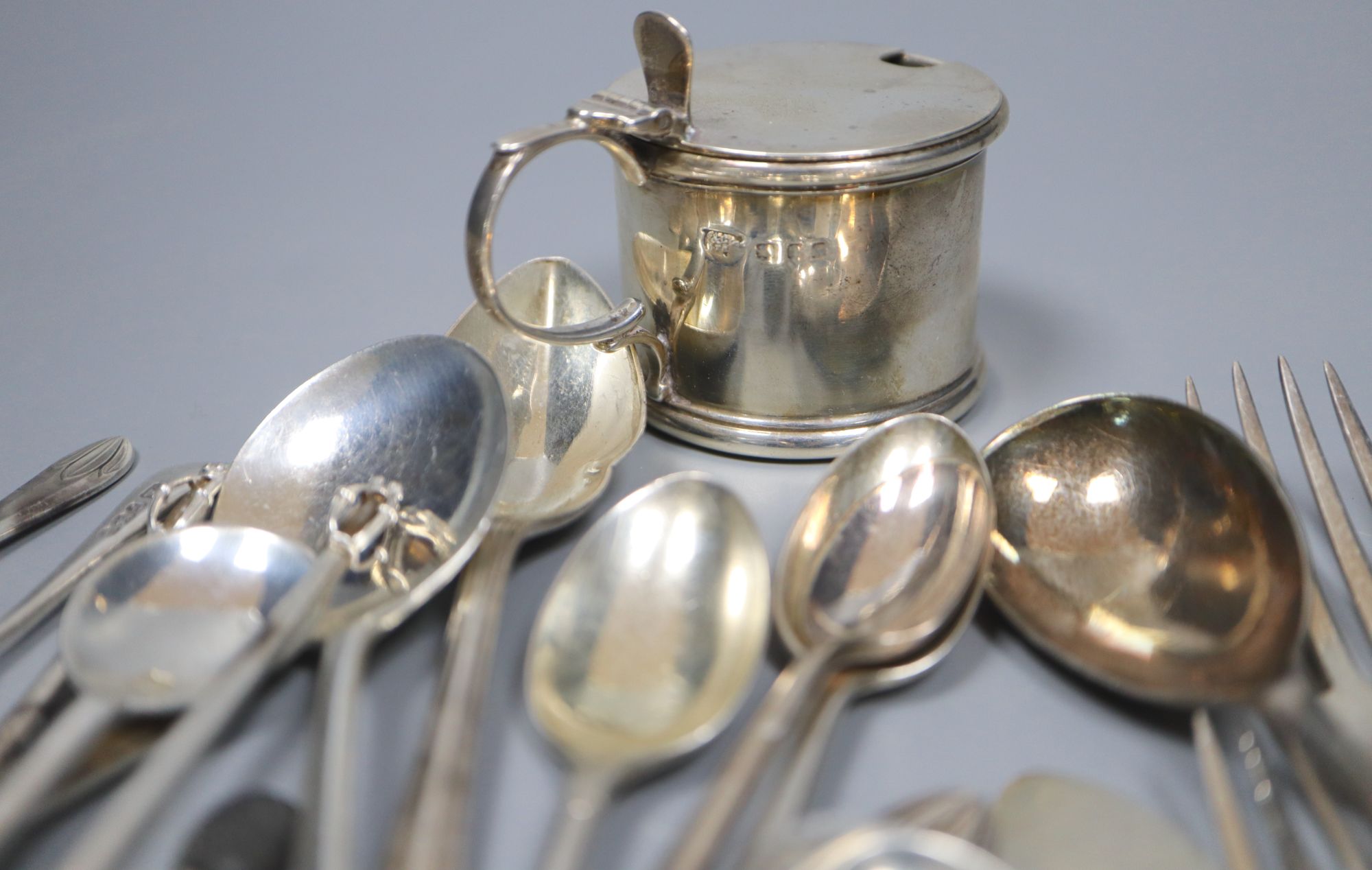A silver mustard and a quantity of assorted small silver cutlery, gross 16.5 oz.